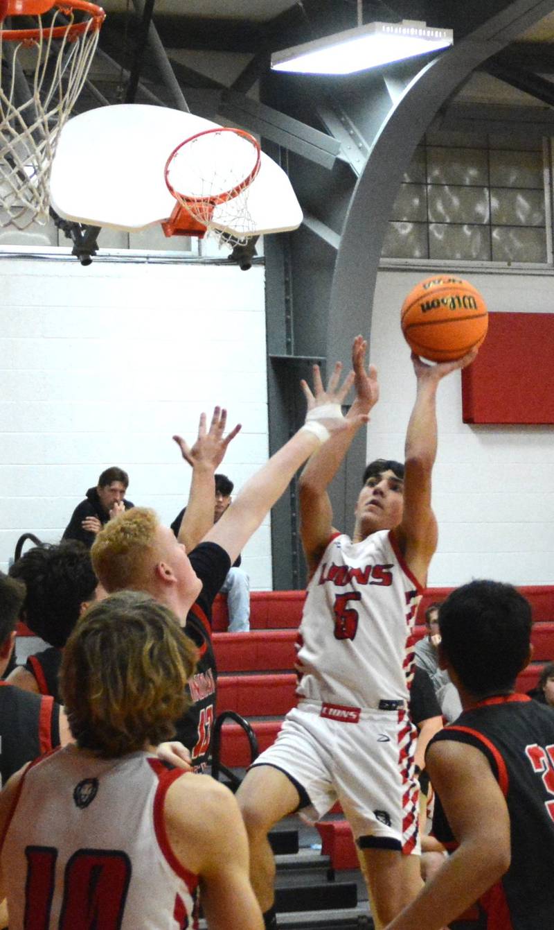 LaMoille sophomore Braden Fischer shoots against Indian Creek in Tuesday's Senior Night game.