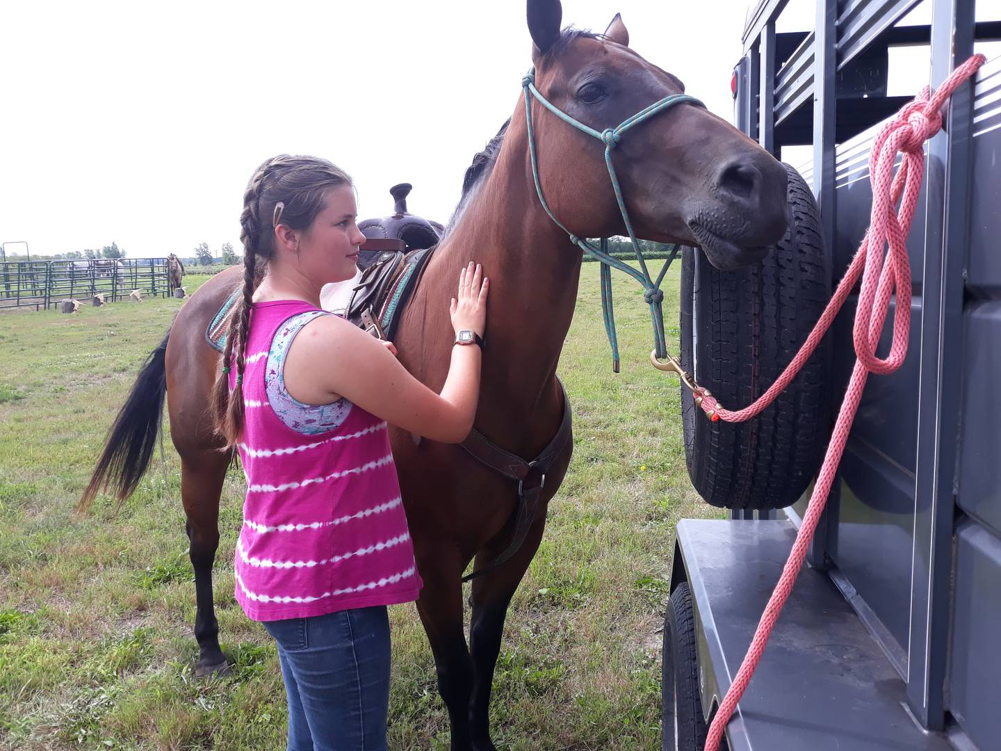 Audrina Hewitt, of rural Streator, cares for a horse at the Arena of Hope on Thursday, July 25, 2022. Hewitt's family regularly attends and helps the cowboy church in rural Cornell.