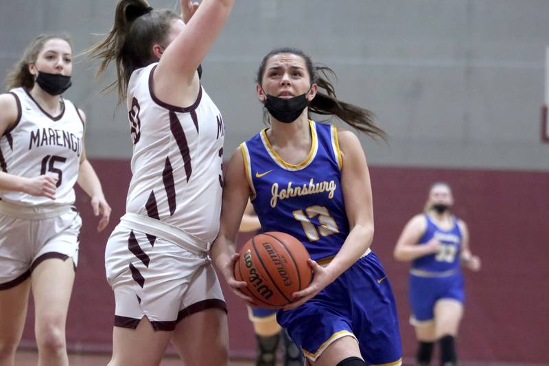 Johnsburg’s Macy Madsen looks for the hoop during girls varsity basketball action in Marengo Thursday night.