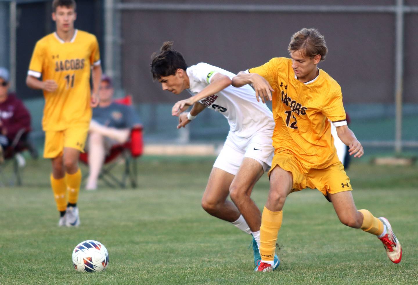 Jacobs’  David Kuklo, right, battles Prairie Ridge’s Trenton Pavoris in varsity soccer at Jacobs High School in Algonquin on Thursday, Sept. 18, 2025.