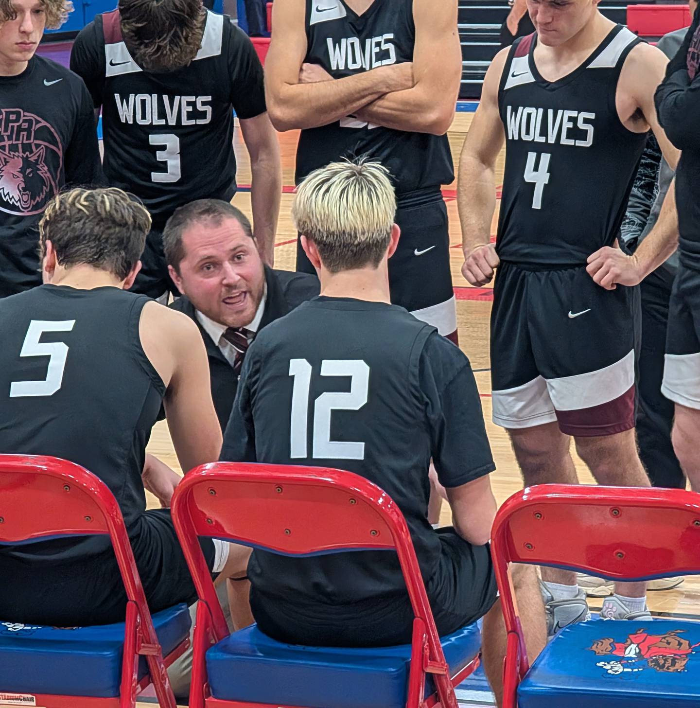 Prairie Ridge boys basketball coach Brian Frericks talks to his team during the Wolves' game against Dundee-Crown on Jan. 15, 2025, in Carpentersville.