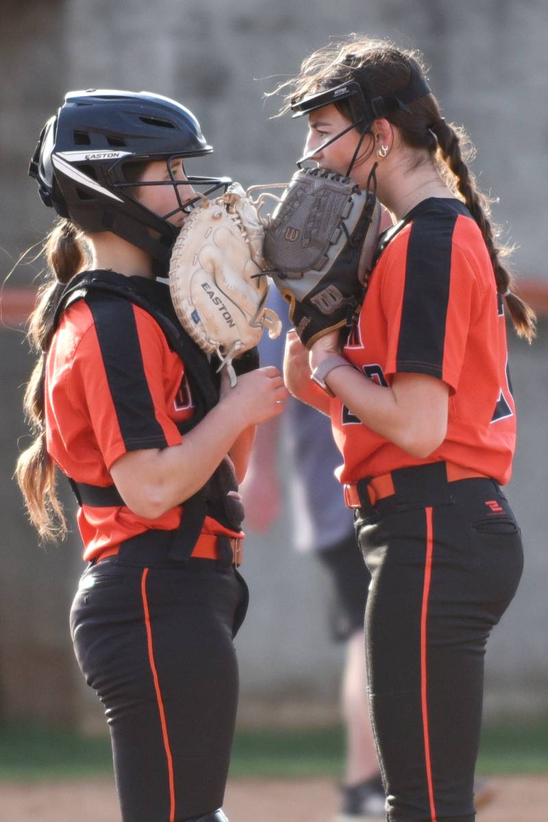 Beecher's Makenzie Johnson, left, and Taylor Norkus talk during a break in the action in a home game against Wilmington Thursday, April 24, 2025.
