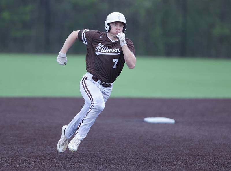Joliet Catholic's Steve Martin (7) rounds second during the varsity baseball game on Wednesday, April 20, 2025 between Nazareth and Joliet Catholic academies in La Grange Park.