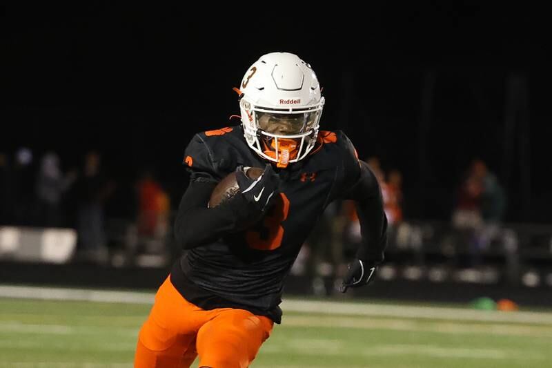 Plainfield East’s Jeremiah Jenkins breaks away on a run against Joliet Central on Oct. 4, 20234 in Plainfield.