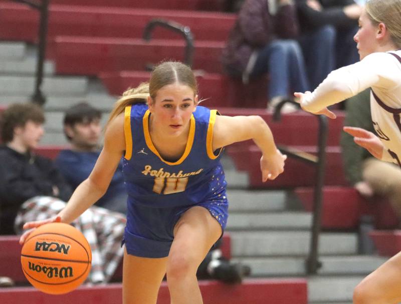 Johnsburg’s Addison Sweetwood moves the ball  in varsity girls basketball on Tuesday, Jan. 6, 2026 at Homer “Bill” Barry Gymnasium on the campus of Marengo High School in Marengo.