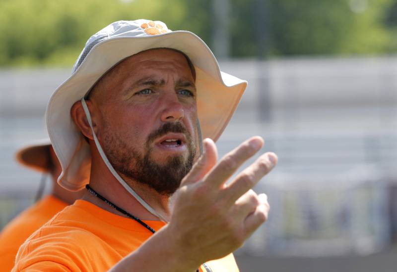 Crystal Lake Central coach Matt MacCrindle watches his team during a 7 on 7 football practice Monday, July 14, 2025, at Richmond-Burton High School, with teams from Richmond-Burton . Grayslake Central and Mundelein.