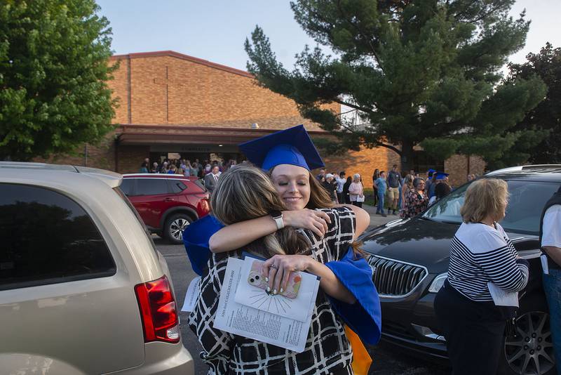 2022 Newman graduate Ashley Wierman hugs mom Tammy after commencement Wednesday, May 18, 2022 at NHS.