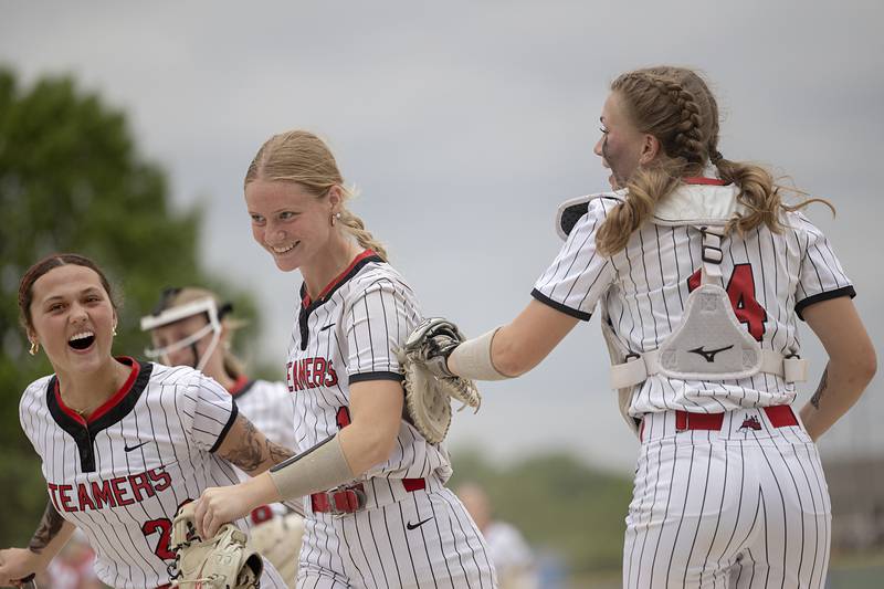 Fulton’s Haley Smither (center) is congratulated after making a double play against Morrison Friday, May 22, 2026, at the Class 1A softball regional at Newman High School.