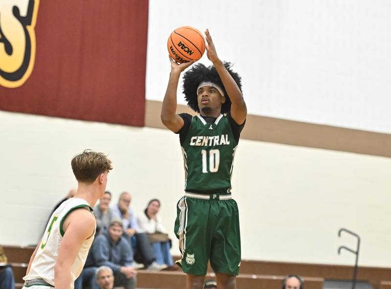 Plainfield Central's Alexis Landfair (10) shoots a deep 3 point shot during the WJOL tournament game against Providence Catholic on Friday, NOV. 28, 2025, at Joliet.