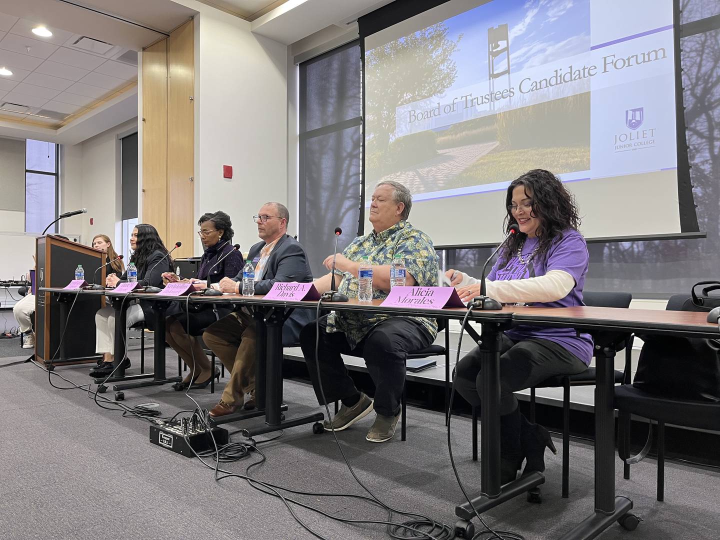 Joliet Junior College Board of Trustees candidates  Alicia Morales (right), Richard Davis, Kevin Kollins Hedemark, Diane Harris and Krystal Garcia Centeno at a candidate forum on Tuesday at the college.