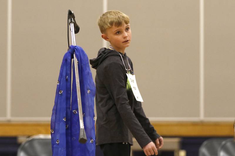 Dylan Haze, a student at Alden-Hebron Elementary School, listens to pronouncer Paul Lockwood during the McHenry County Regional Office of Education’s 2025 Spelling Bee on Wednesday, March 19, 2025, at Bernotas Middle School in Crystal Lake.
