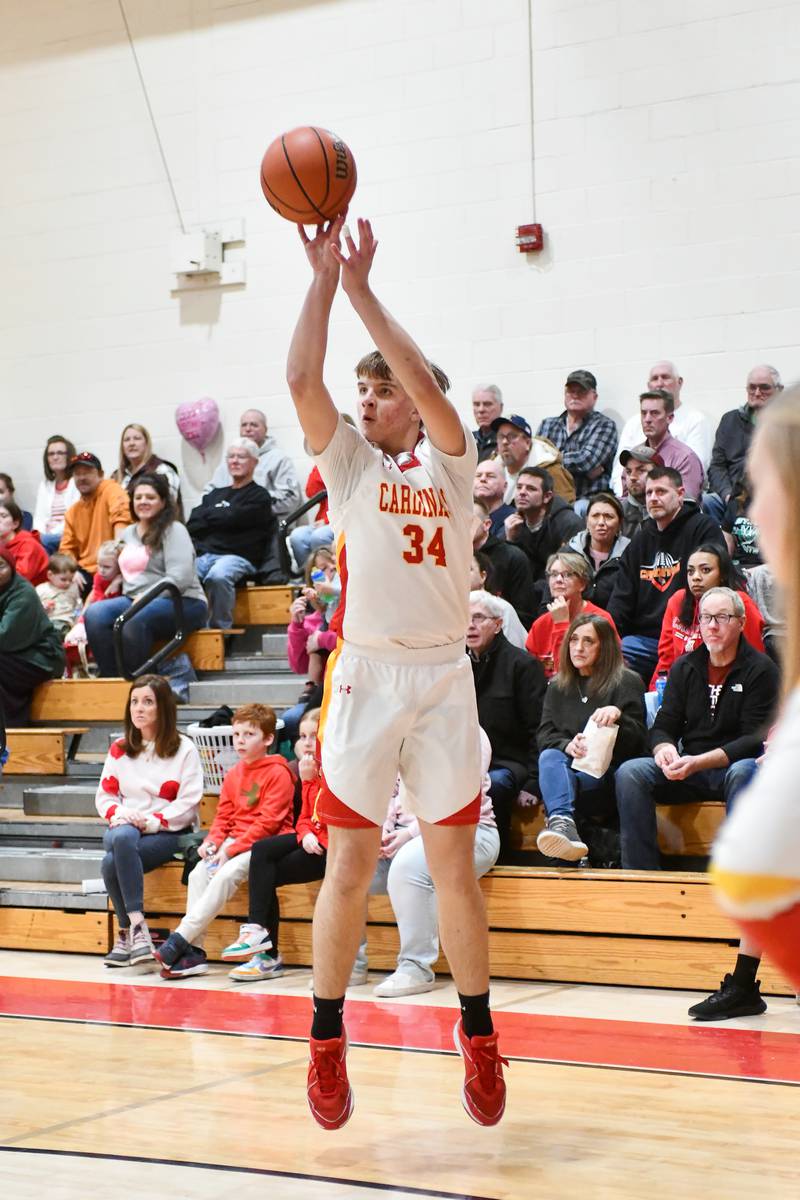 St. Anne's Jason Blyle shoots a 3-pointer on Friday, Feb. 14, 2025, during the Cardinals' 70-38 victory over Beecher in the River Valley Conference championship.