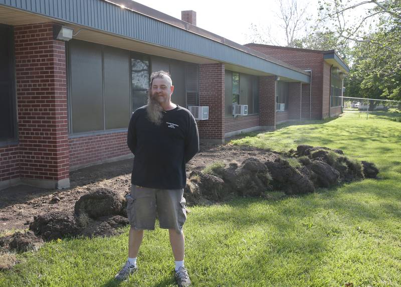 Custodian Bob Espel shows off his new look on Wednesday, May 22, 2024 at Douglas Elementary School in Princeton. Epsel shaved half of his face in the morning and half in the afternoon to accomdate preschool classes. Students raised more than $3.332 in the past few weeks. All proceeds will go to the new landscaping around the Douglas building, with the first round of plantings to take place with students present this Thursday, May 23. Using funds from the Preschool for All grant the school has purchased new age-appropriate playground equipment to promote physical activity, creativity and social interaction.