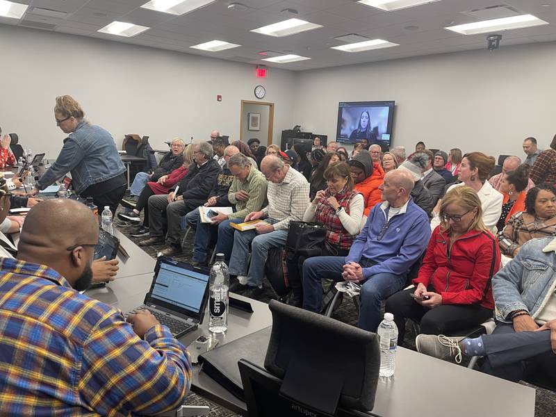 Dozens packed the Dec. 12, 2023 meeting of the DeKalb School District 428 board.