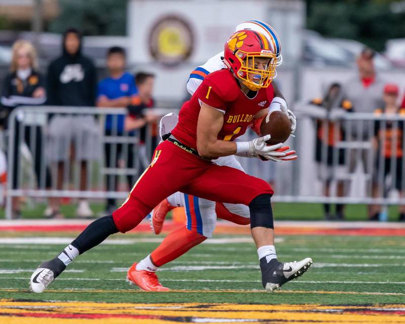 Batavia's Trey Urwiler (1) catches a pass against East St. Louis in Batavia Aug. 31 2019.
