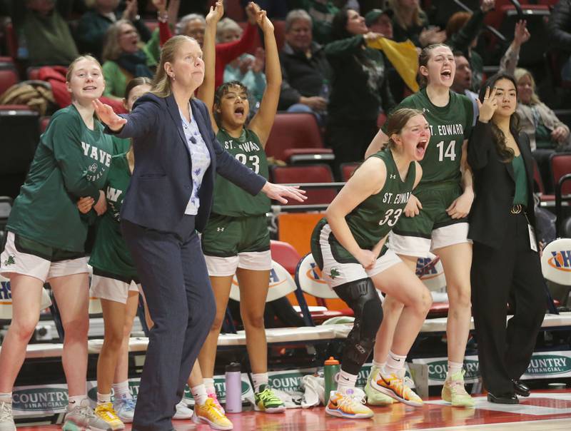 Members of the St. Edward girls basketball team react while playing Cissna Park during the Class 1A fourth place trophy on Friday, March 7, 2025 at CEFCU Arena in Normal.