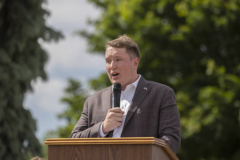 State Rep. Bradley Fritts speaks to the crowd during a ceremony naming the road in front of Dixon High School as “Mark Dallas Way” on Tuesday, May 30, 2023.