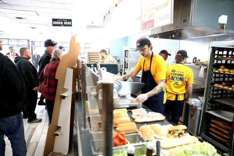 A line forms at Jersey Mike’s Subs in Geneva on Wednesday, March 26, 2025 for the Day of Giving. Jersey Mike’s owners and operators throughout Illinois donated every single dollar that came in that day to Cal’s Angels Pediatric Cancer Foundation, which is based in St. Charles.