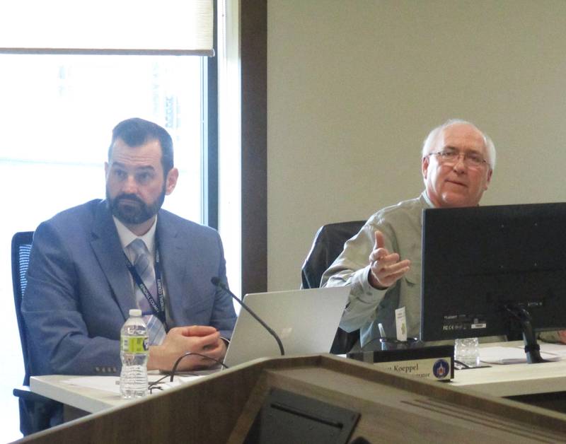 Kendall County Board member Brian DeBolt speaks in favor of a full-access driveway for a proposed gasoline station on Eldamain Road on Plano's far west side, on April 19, 2022. To the left is County Administrator Scott Koeppel. (Mark Foster -- mfoster@shawmedia.com)
