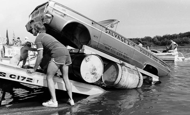 The Anything That Floats races were held from 1978-1986 each year in Peru. Contestants received a free case of Old Style beer upon entering. The rules were simple. To enter, participants needed to build a raft less than 50 feet in length and each person had to have a life jacket on board whether you wore it or not. A rope had to be attached to the raft for towing. Rafts were made from styrofoam, inter tubes or barrels. A minimum of two paddles were required on the float. Rafts were launched at the Starved Rock Boat Ramp and finished at the Peru boat launch area. Over time, the event grew and got to big and out of control that organizers had to scrap it. This photo was found in the La Salle NewsTribune archives.