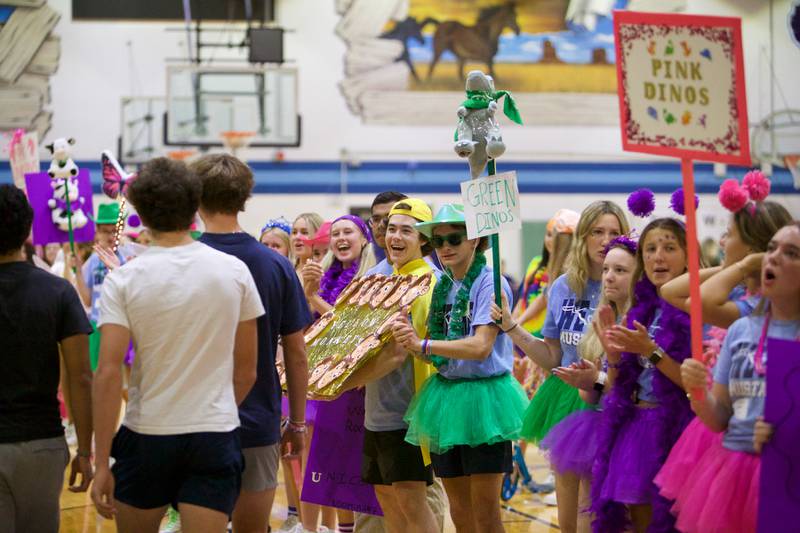 Downers Grove South freshmen enter the gym at the Mustang Mad Dash orientation on Saturday Aug.10, 2024 in Downers Grove.