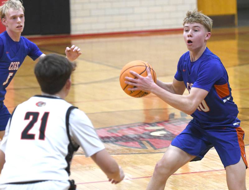 Genoa-Kingston's Trevor Rhoads (10) gets ready to pass against Warren on Saturday, Dec. 13, 2025 at the 64th Annual Forreston Holiday Basketball Tournament held at Forreston High School.