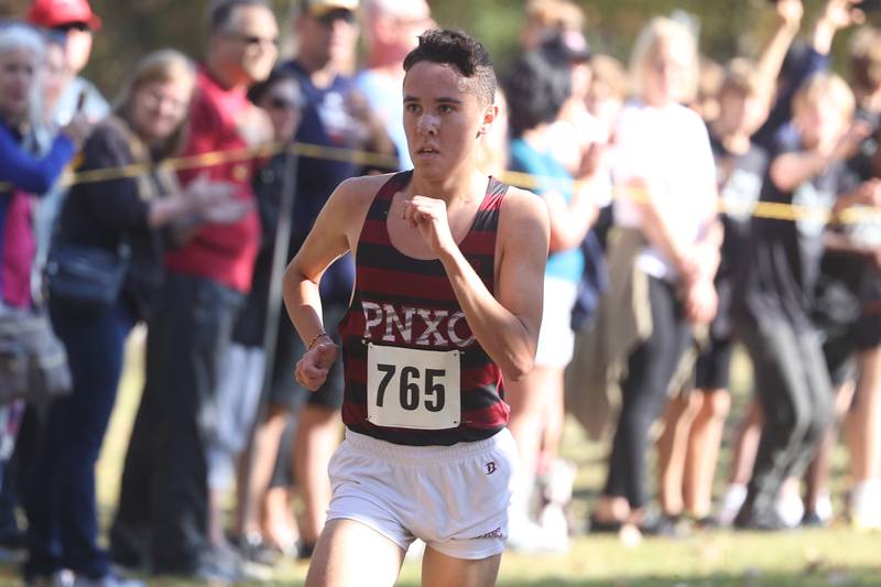 Plainfield North’s Oliver Burns finishes first easily in the Boys Cross Country Class 3A Minooka Regional at Channahon Community Park on Saturday.