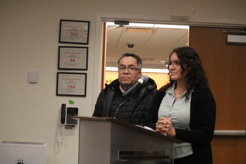 Cirilio Mendez and Adilene Flores (right) approach the DeKalb Planning and Zoning Commission Jan. 21, 2025, with a special use permit request hoping to enable the operation of an automobile sales business in town.
