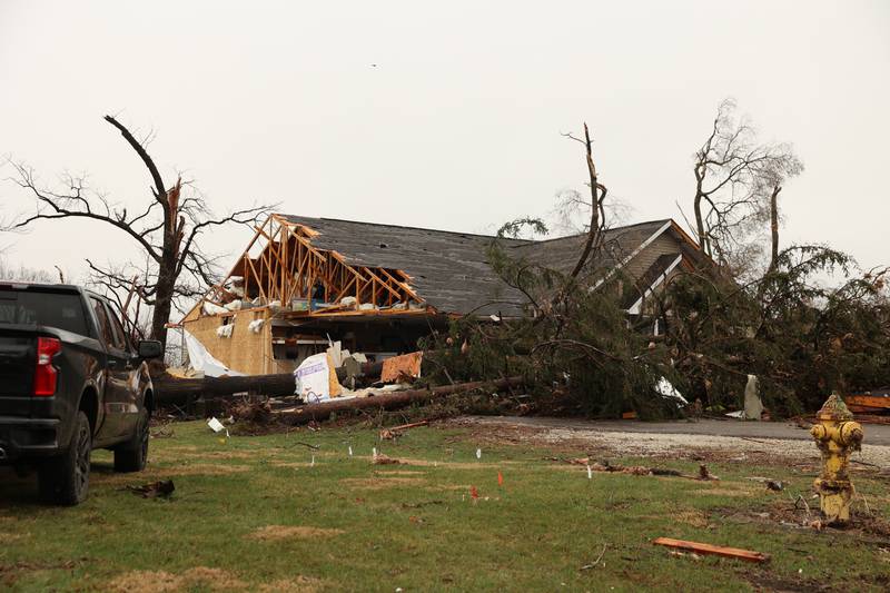 Damage is seen along Elmwood Drive in Aroma Park  on March 11, 2026 following a March 10 tornado that passed through Kankakee County.