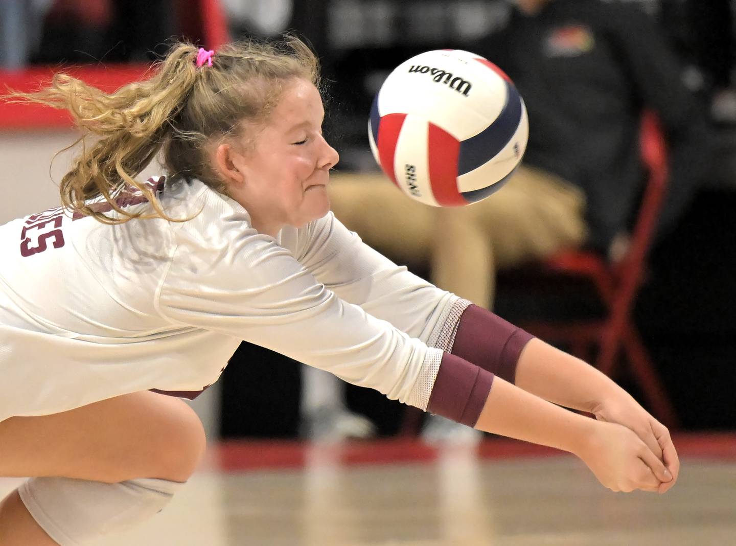 Prairie Ridge’s Tegan Vrbancic takes a ricocet to the face in the Class 3A third place match against Providence Catholic at the IHSA girls volleyball state finals tournament on at Illinois State University on Saturday, Nov. 15, 2025