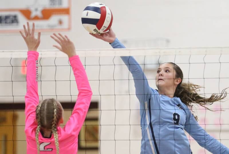 Parkview Christian's Abigail Carlyle hits the ball past Earlville's Jessica Miller during the Class 1A Regional semifinal game on Monday, Oct. 28, 2024 at Serena High School.
