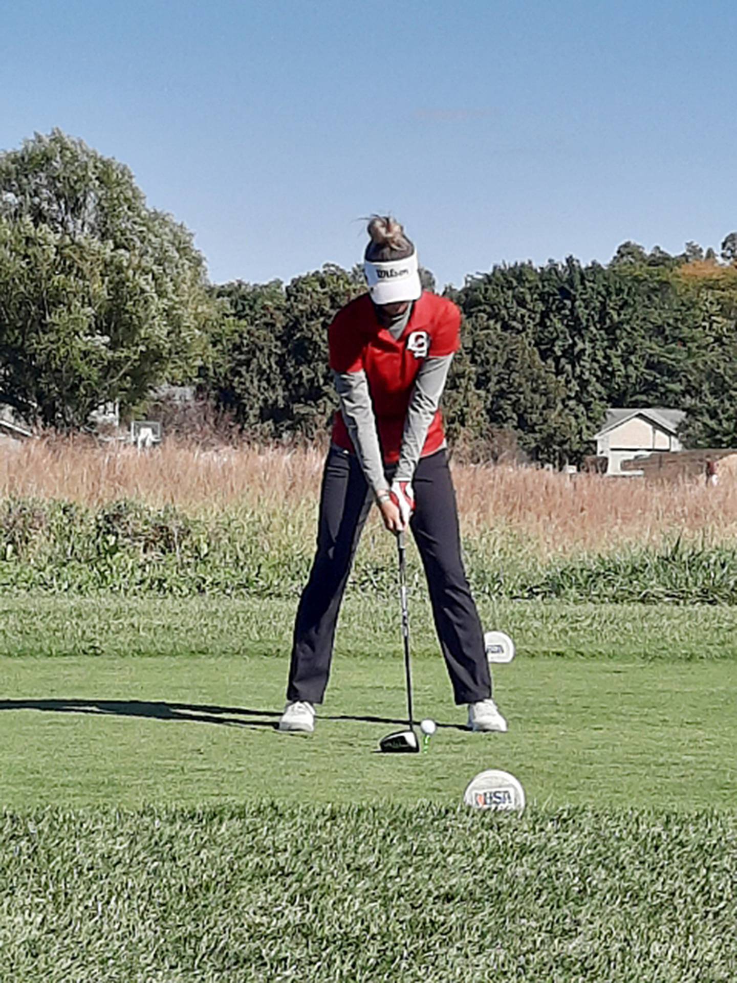 Oregon senior Ava Hackman gets ready to tee off during the Class 1A State Tournament on Saturday, Oct. 8, 2022 at Red Tail Run Golf Course in Decatur. Hackman tied for 21st with a two-day total of 15-over-par 159.
