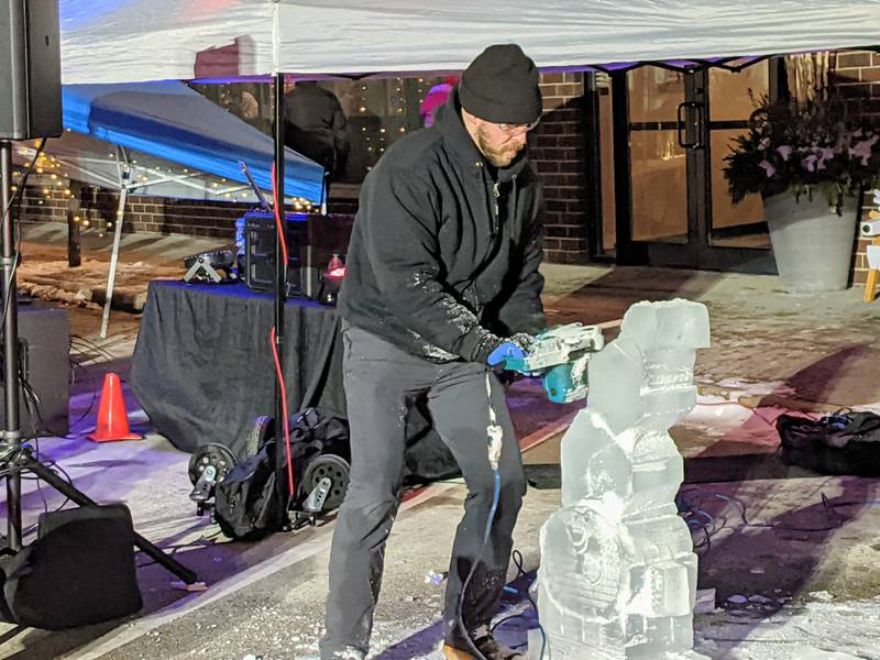 Ice sculpting was part of the Oswego Christmas Walk on Friday, Dec. 5, 2025.