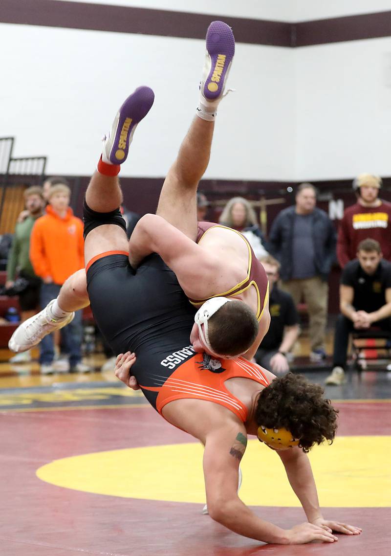 Richmond-Burton’s Blake Livdahl takes down Winnebago’s Johnny Strauss during a190-pound match in the Tom DuBois Invite wrestling meet on Saturday, Dec. 13, 2025, at Richmond-Burton High School in Richmond.