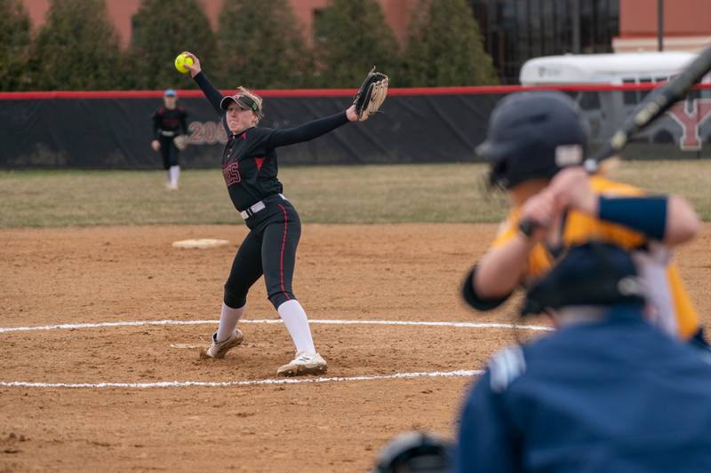 Yorkville's Madi Reeves (2) delivers a pitch against Neuqua Valley during a softball game at Yorkville High School on Wednesday, April 6, 2022.