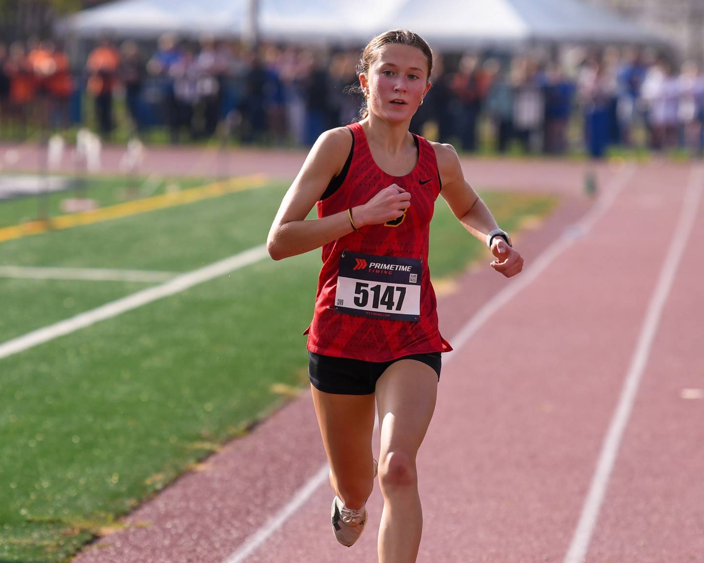 Avery Hacker of Batavia approaches the finish line during the DuKane Conference meet on Saturday Oct. 18, 2025, held at Lake Park High School East's campus where she finished 2nd with a time of 16:59.3.