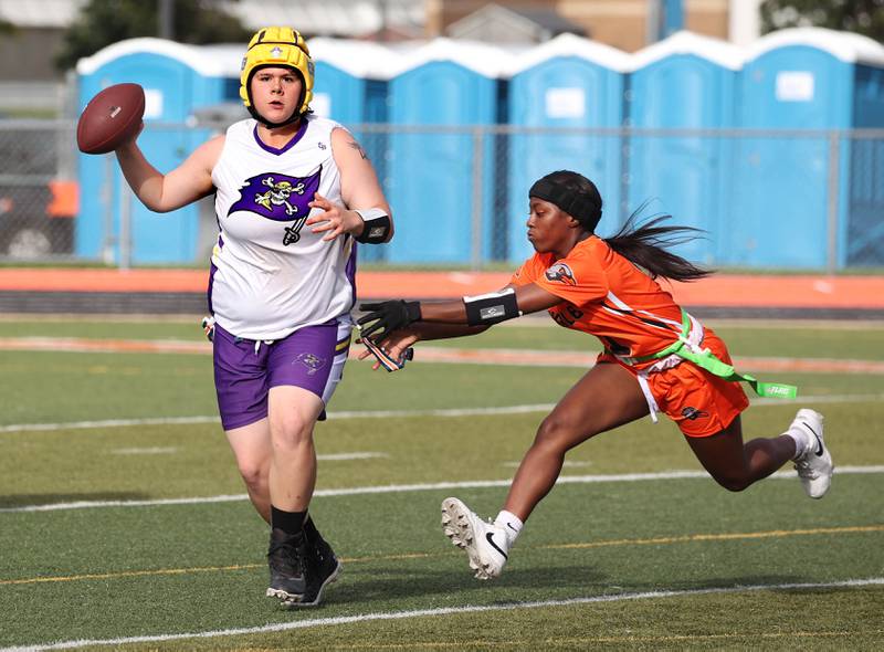 DeKalb's De'Ayshia Killingsworth sacks the quarterback Monday, Aug. 25, 2025, during their game against Belvidere at DeKalb High School. The contest marked the first ever game for the girls flag football program at DeKalb.