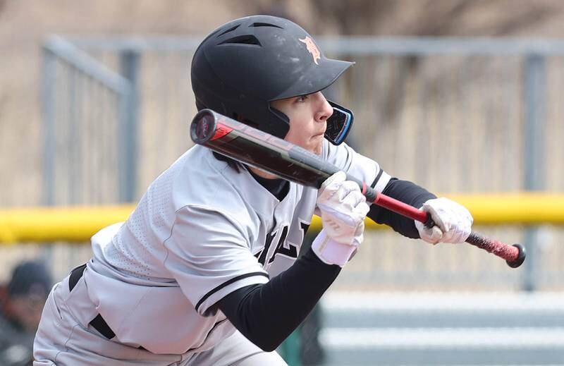 DeKalb's Nathaniel Nunez squares around to bunt during their game against Kaneland Friday, April 15, 2022, at Kaneland High School in Maple Park.