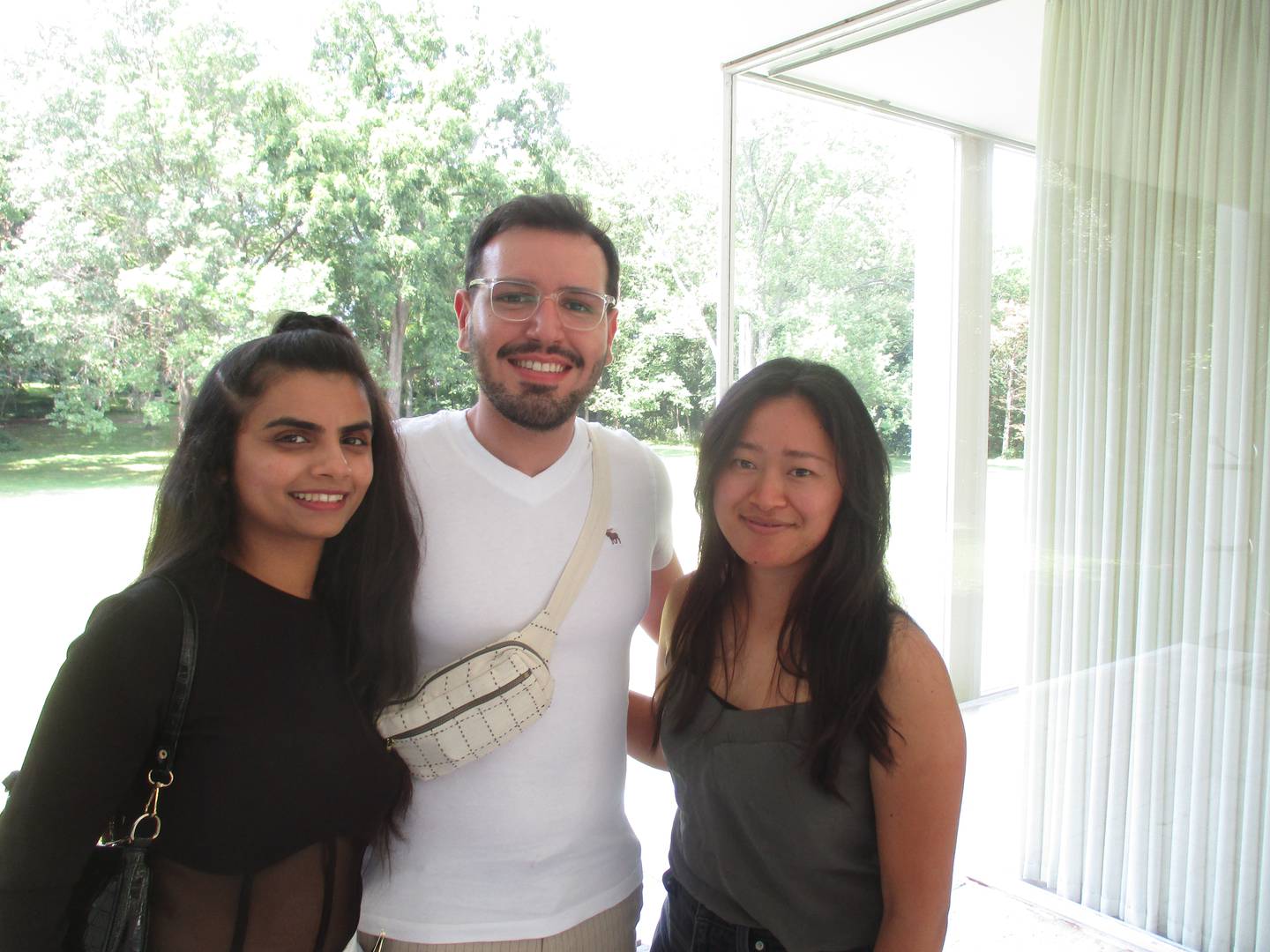Architecture students Shabnam Rajani of India, from left, Allan Killion of Brazil and Kapua Arsiga of Hawaii were visiting the Edith Farnsworth House on July 23, 2023.