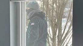 Woman found dead inside Oswego home, suspect in custody