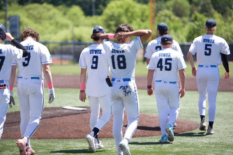 Harvest Christian leaves the field after losing to Marquette at the Class 1A Sectional Final on Saturday May 25, 2024 in Elgin.