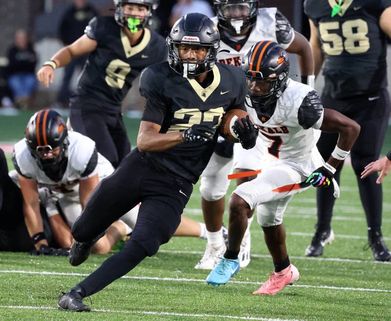 Sycamore's Dylan Curtis gets through the DeKalb defensive line Friday, Aug. 29, 2025, during the FNBO Challenge in Huskie Stadium at Northern Illinois University.