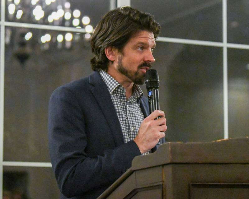 St. Charles Area Chamber of Commerce Board member Adam Hogan gives closing remarks at the chamber's Charlemagne Awards dinner on Friday May 1, 2026.