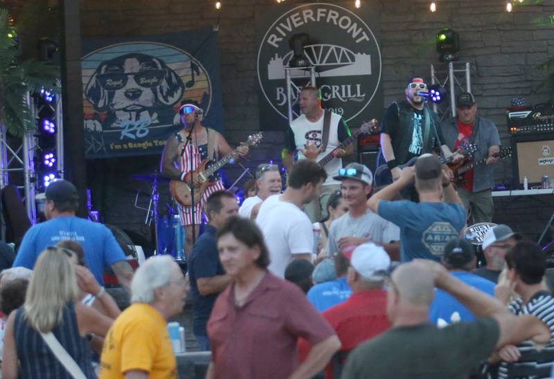 Regal Beagel plays at River Front Bar and Grill during the "Rock the River 4th of July celebration on Thursday, July 3, 2025 along Water Street in Peru.