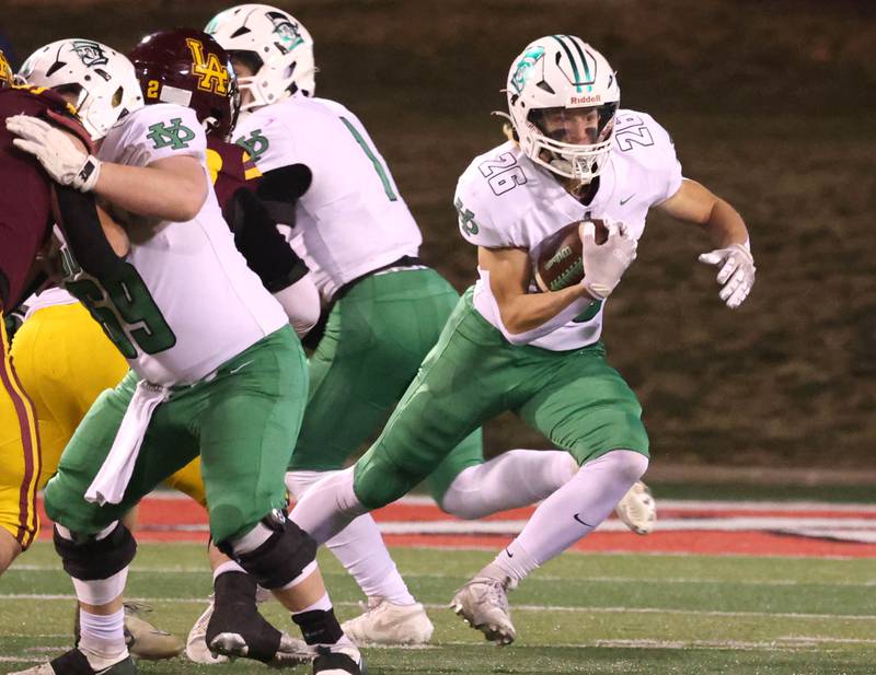 York’s Henry Duda carries the ball during their Class 8A state championship game against Loyola Saturday, Nov. 30, 2024, in Hancock Stadium at Illinois State University in Normal.