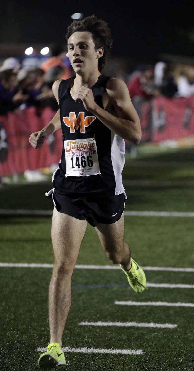 Photos Naperville North's Twilight Invitational cross country meet