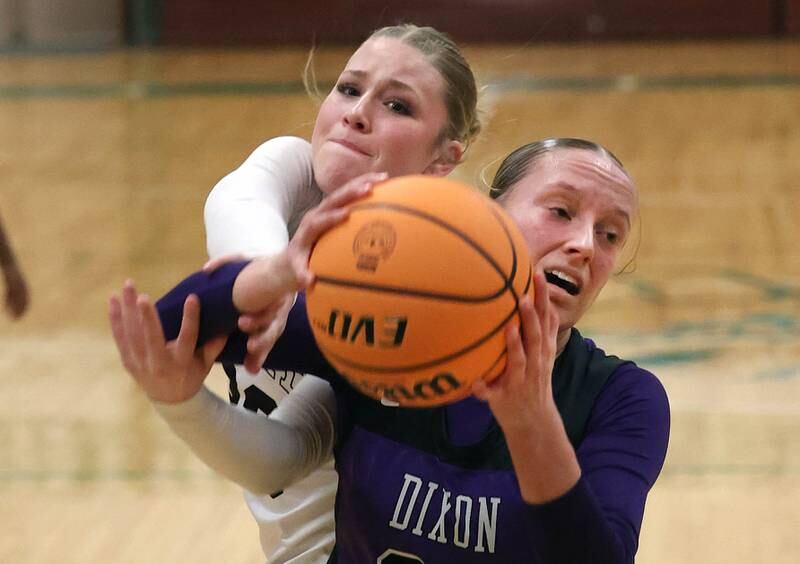 Dixon’s McKenzie Toms and Kaneland's Kendra Brown go after a rebound during their Class 3A sectional semifinal game Tuesday, Feb. 25, 2025, at Boylan Catholic High School in Rockford.