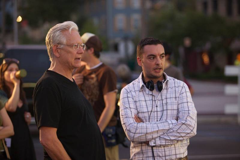 Local filmmaker Nicholas Smith (right) and actor Bruce Davison (left) talk on the set of "Munger Road" in 2010 while filming in St. Charles.