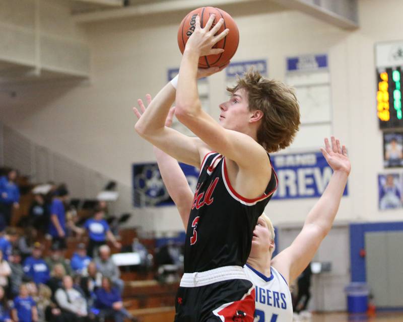 Hall's Max Bryant eyes the hoop as Princeton's Daniel Sousa defends on Friday, Jan. 26, 2024 at Princeton High School.