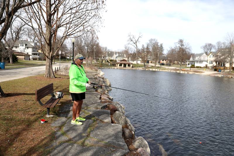 Scott Rowell of Darien fishes at Prince Pond in Downers Grove on Tuesday, March 12, 2024.